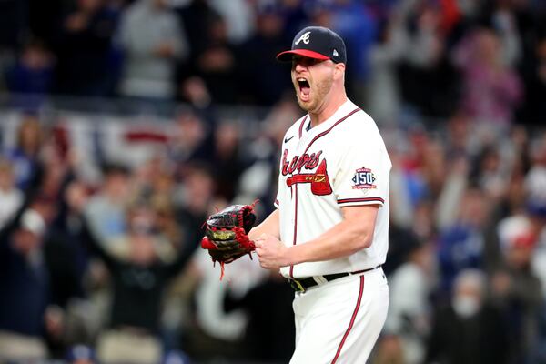 Braves relief pitcher Will Smith reacts after recording the third out in the ninth inning of Game 2 of the NLDS against the Los Angeles Dodgers Sunday, Oct. 17, 2021, at Truist Park in Atlanta. (Curtis Compton / curtis.compton@ajc.com)