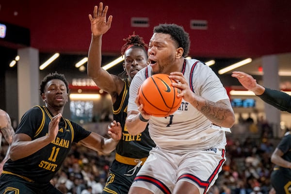 Jackson State center Shannon Grant (7) goes for the basket during the first half of an NCAA basketball game in the championship of the Southwest Athletic Conference Championship tournament against Alabama State, Saturday, March 15, 2025, in College Park, Ga. (AP Photo/Erik Rank)