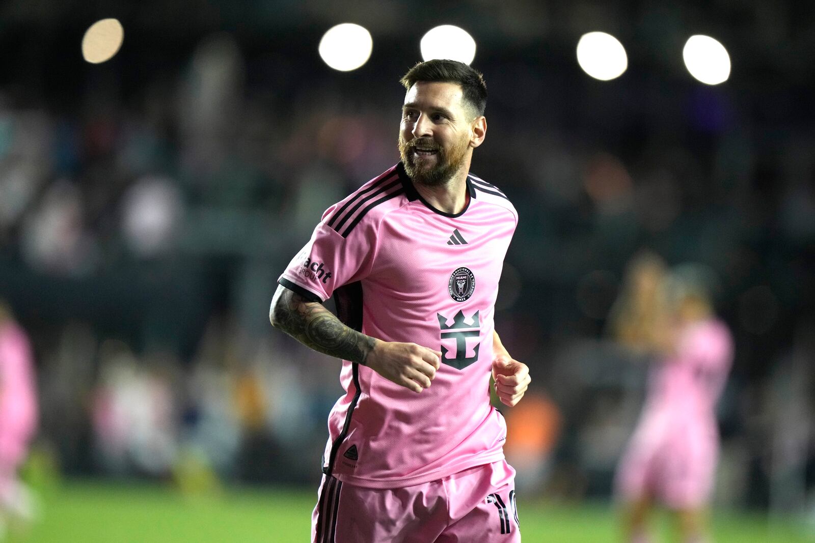 Inter Miami forward Lionel Messi reacts after scoring a goal during the second half of an MLS soccer match against the New England Revolution, Saturday, Oct. 19, 2024, in Fort Lauderdale, Fla. (AP Photo/Lynne Sladky)