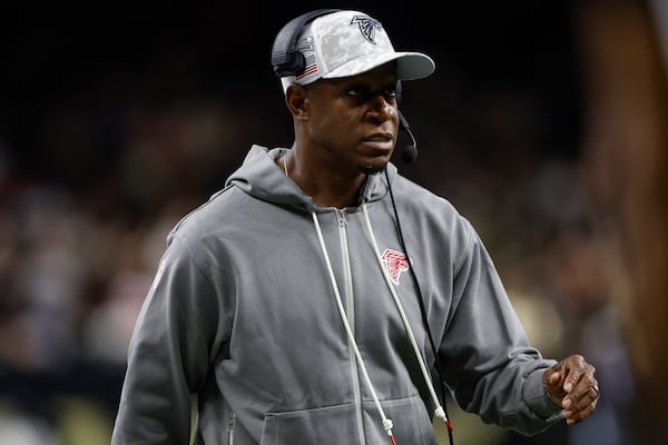 Atlanta Falcons head coach Raheem Morris watches play against the New Orleans Saints during the first half of an NFL football game, Sunday, Nov. 10, 2024, in New Orleans. (AP Photo/Butch Dill)