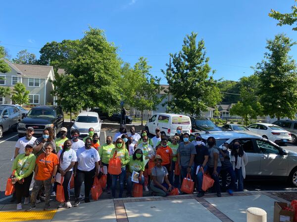 Volunteers gathered May 15, 2021, in west Atlanta to spread awareness about potential lead contamination in the neighborhood. ANDY MILLER / GEORGIA HEALTH NEWS