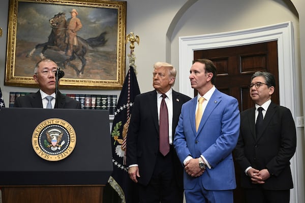 Euisun Chung, Hyundai Motor Group executive chairman, from left, speaks as President Donald Trump, Louisiana Gov. Jeff Landry and Hyundai Motor Company CEO Jaehoon Chang look on in the Roosevelt Room of the White House in Washington, Monday, March 24, 2025. (Pool via AP)