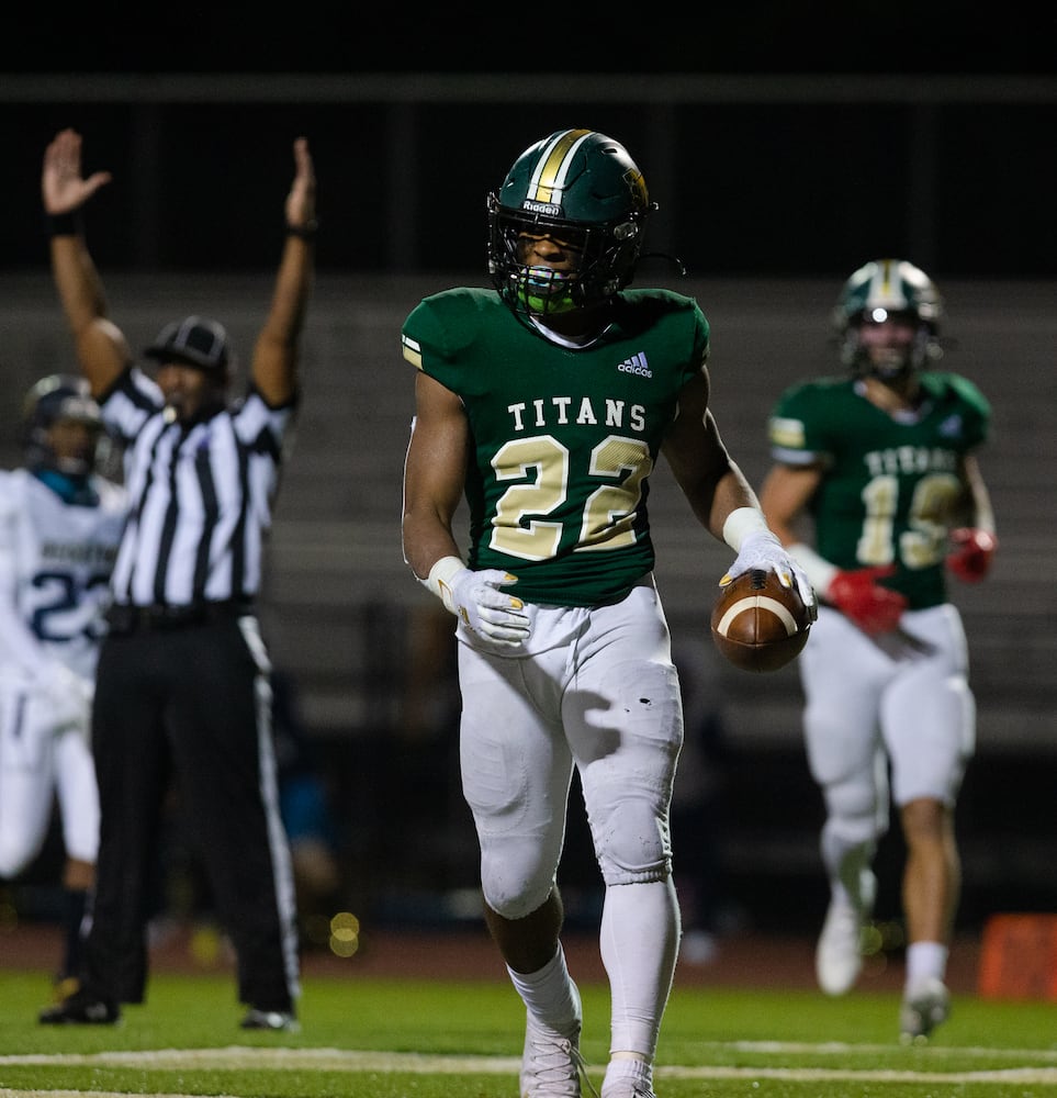 Justice Haynes (22), sophomore running back for Blessed Trinity, walks out of the endzone after scoring a touchdown during the Blessed Trinity vs. Decatur high school football game on Friday, December 4, 2020, at Blessed Trinity high school in Roswell, Georgia. Blessed Trinity defeated Decatur 44-0 in the second round playoff game. CHRISTINA MATACOTTA FOR THE ATLANTA JOURNAL-CONSTITUTION.