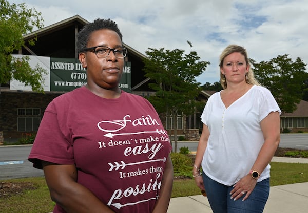 Former executive directors Tiffany Echols, left, and Nikki Windsor stand outside Tranquil Gardens Assisted Living & Memory Care in Acworth on Wednesday. Windsor said she slowly learned about the financial troubles and now wishes that she had warned residents. (Hyosub Shin / Hyosub.Shin@ajc.com)