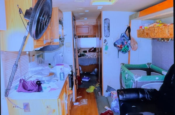 A police photograph of the inside of the camper where prosecutors said 9-month-old Cody Palmer was beaten unconscious in January 2022. (Joe Kovac Jr. / AJC)