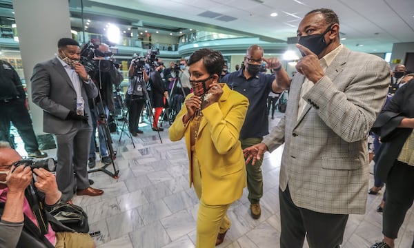 May 7, 2021 Atlanta:  Atlanta Mayor Keisha Lance-Bottoms held a press conference Friday, May 7, 2021 at Atlanta City Hall speaking about her decision not to run for a second term. Here she is shown with husband Derek. (John Spink / John.Spink@ajc.com)