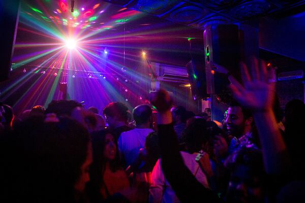 CAIRO, EGYPT - DECEMBER 17: People dance at a live music venue on December 17, 2016 in Cairo, Egypt. 