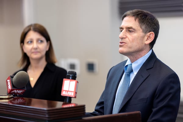 (L-R) CDC Director Mandy Cohen watches Jonathan Mermin, director of the National Center for HIV/AIDS, Viral Hepatitis, STD and TB Prevention, speak at Grady’s Ponce de Leon Center in Atlanta on Wednesday, June 5, 2024, during a press conference about the CDC’s release of a new medical tool to help some people prevent sexually transmitted infections. (Arvin Temkar / AJC)