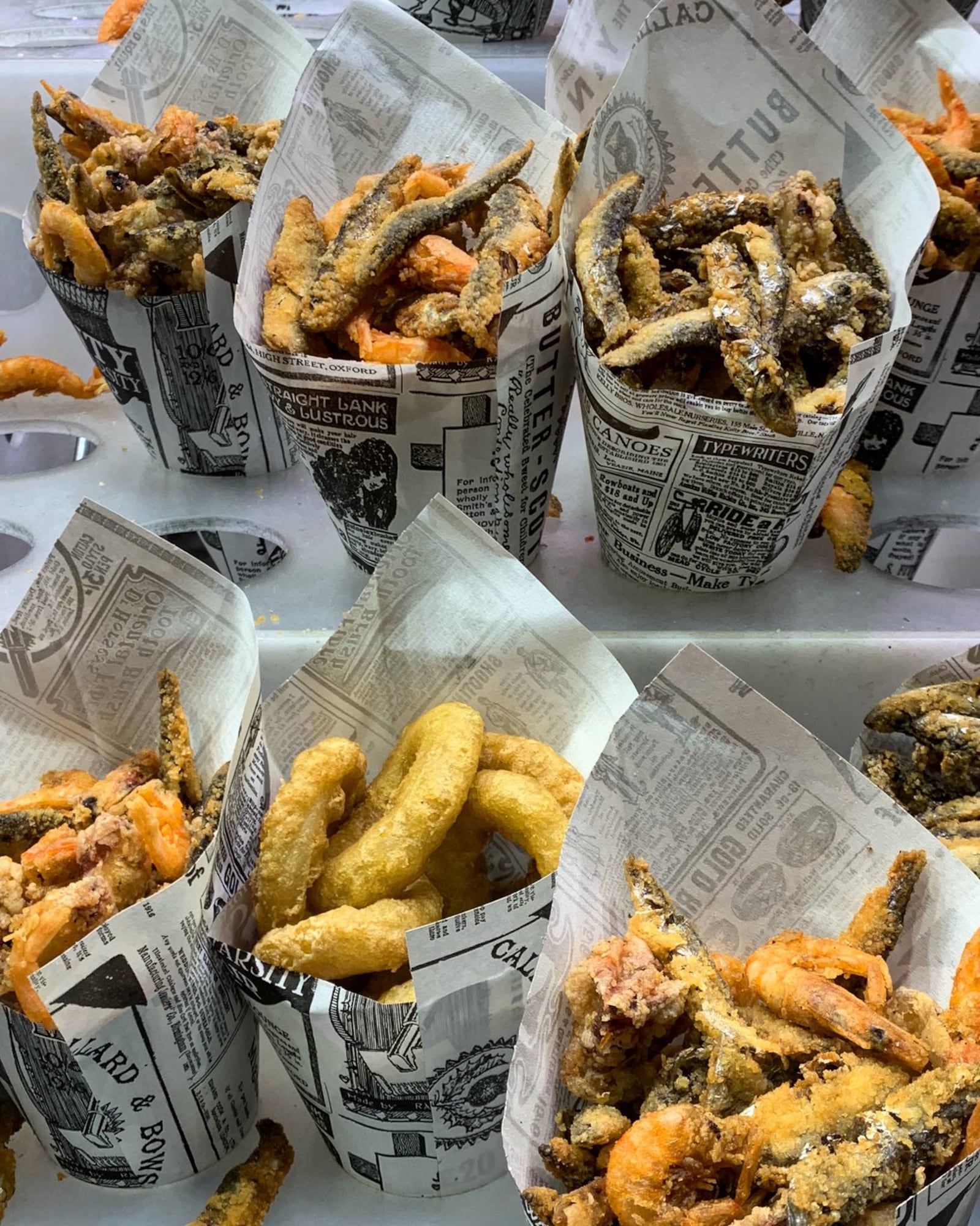 Fried anchovies are available at a stall at La Boqueria food market in Barcelona, Spain. CONTRIBUTED BY ASHA GOMEZ