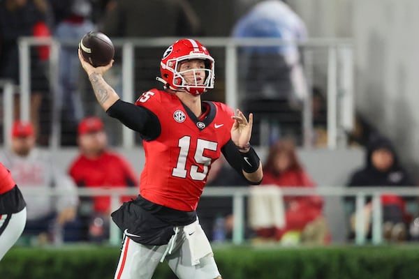 Georgia quarterback Carson Beck (15) attempts a pass during their game against Ole Miss at Sanford Stadium, Saturday, November 11, 2023, in Athens, Ga. Georgia won 52-17. (Jason Getz / Jason.Getz@ajc.com)