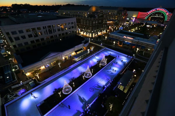 Skaters take to the ice at a 10,000-square-foot open-air ice skating rink in Atlantic Station on November 14, 2013 in Atlanta, Ga. Skate Atlantic Station is one of many ice skating rinks in metro Atlanta.