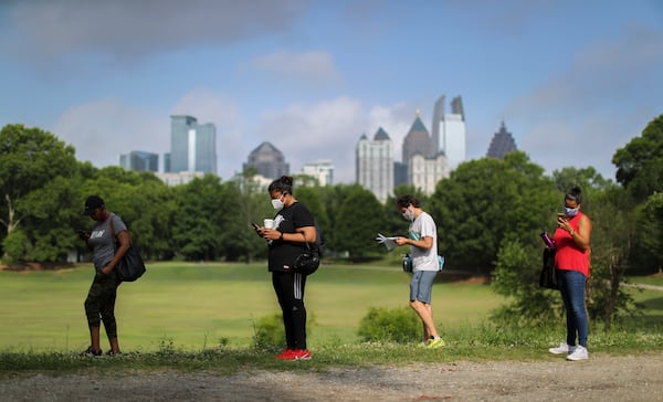 June 9, 2020 Atlanta: Voters had a long wait (some 2-3 hours) at the Park Tavern polling place located at 500 10th St NE, on Tuesday, June 9, 2020 in Atlanta. Many voters said they requested absentee ballots but never received them. Two lines, 300-yards long each formed parallel to Piedmont park in the parking lot as people patiently waited to vote. Over 1.2 million people had already voted before the polls opened on Tuesday, three-quarters of them with absentee-by-mail ballots, allowing them to avoid human contact at the polls. Voters will decide on many candidates, from president to county sheriff. The ballot also includes races for U.S. Senate, U.S. House and the Georgia General Assembly. JOHN SPINK/JSPINK@AJC.COM