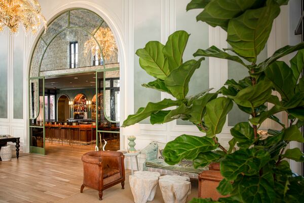 Decked out in rich woods and brass accents, The Lobby Bar is a comfortable nook for unwinding and sipping on Charleston-inspired drinks. 
(Courtesy of JB McCabe)