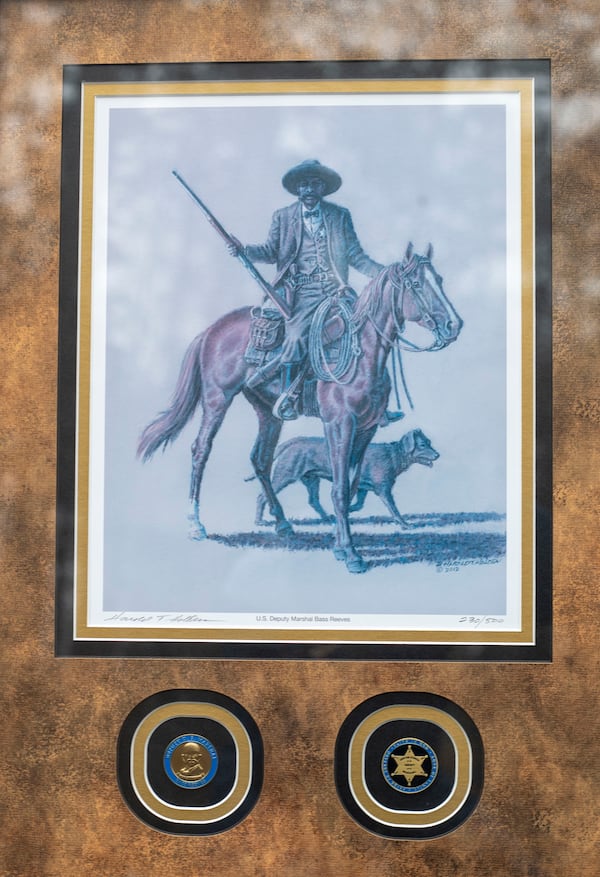 A family painting of Bass Reeves, one of the first Black deputy U.S. marshals west of the Mississippi River. (Alyssa Pointer / Alyssa.Pointer@ajc.com)