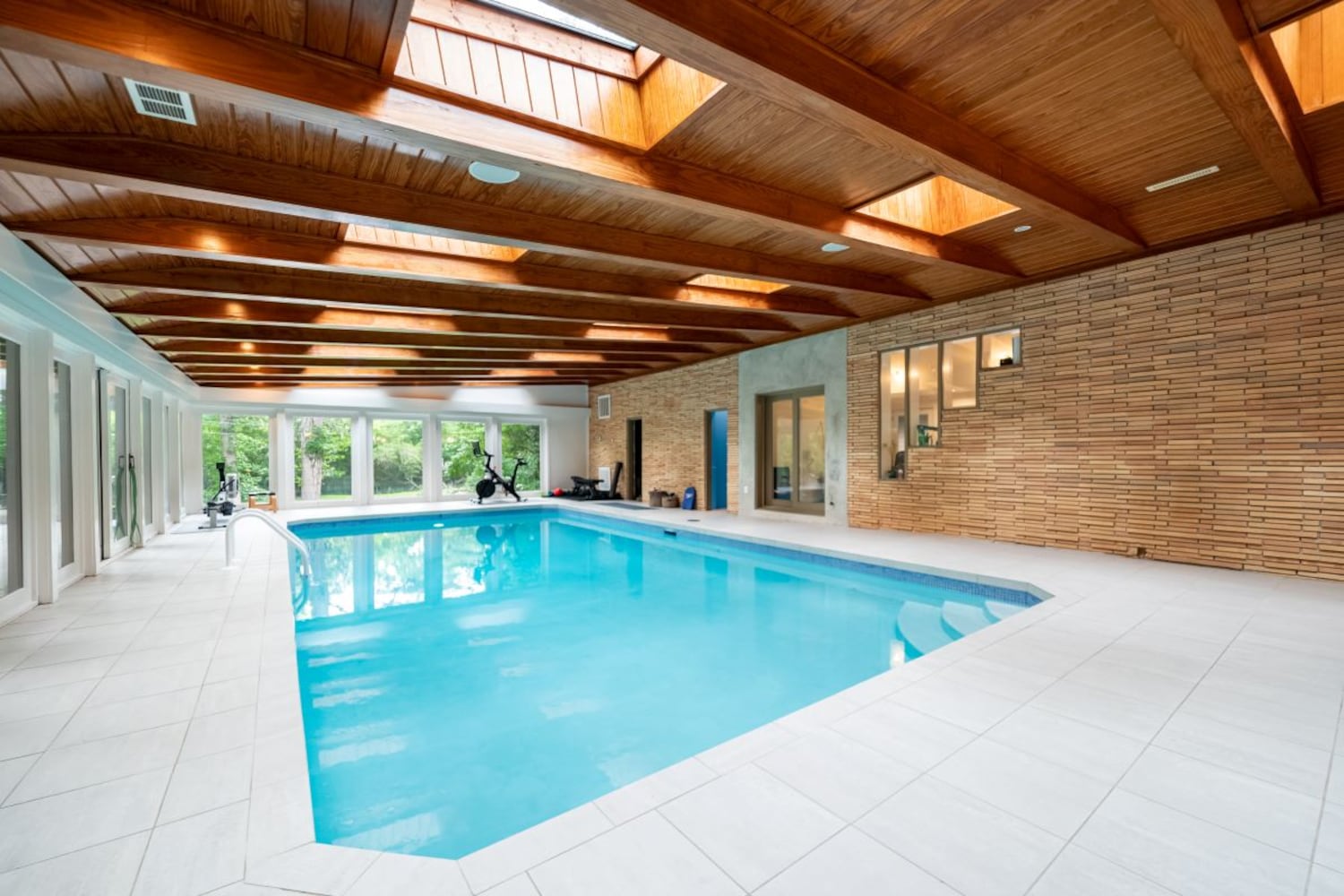 Photos: Indoor pool, infinity tub complete renovated mid-century modern home