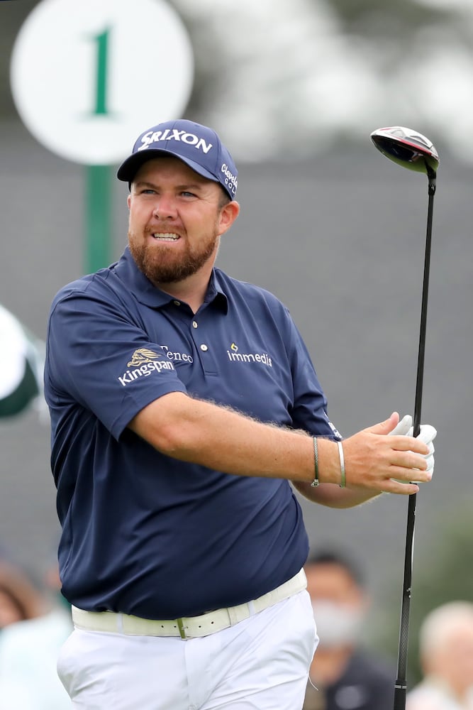 April 9, 2021, Augusta: Shane Lowry hits his tee shots on the first hole during the second round of the Masters at Augusta National Golf Club on Friday, April 9, 2021, in Augusta. Curtis Compton/ccompton@ajc.com