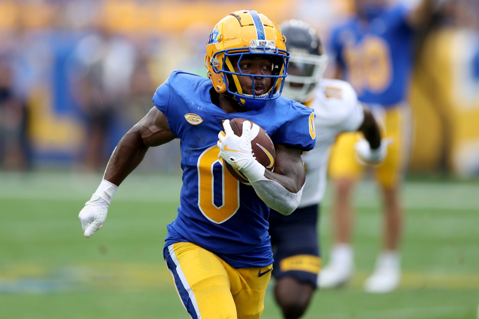 FILE - Pittsburgh's Desmond Reid (0) in action against Kent State during an NCAA football game, Aug. 31, 2024, in Pittsburgh. (AP Photo/Gregory Payan, File)