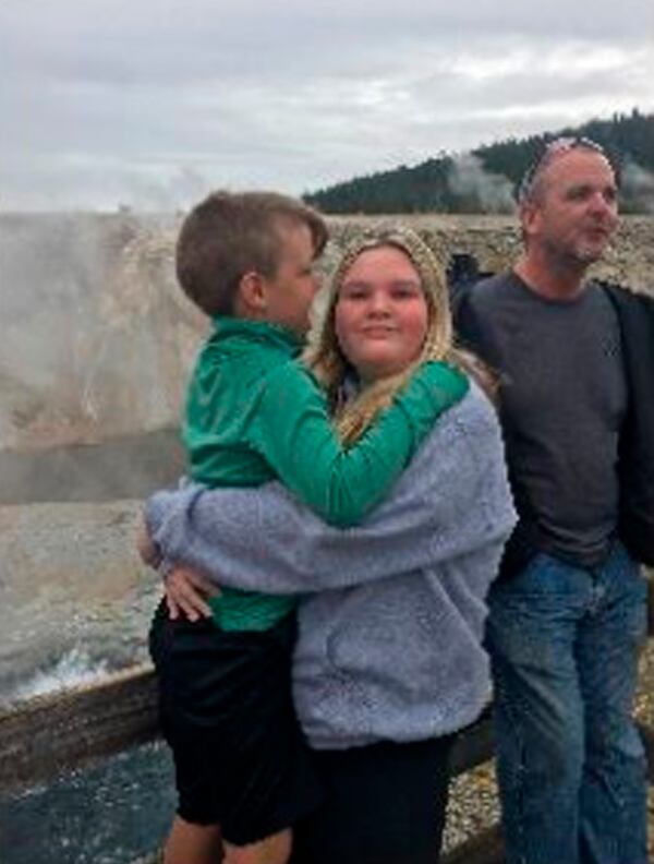 In this photo released by the Federal Bureau of Investigation, 7-year-old Joshua Vallow, his sister, 17-year-old Tylee Ryan, and their uncle, Alex Cox, are shown in Yellowstone National Park on September 8, the last day Tylee was seen alive.