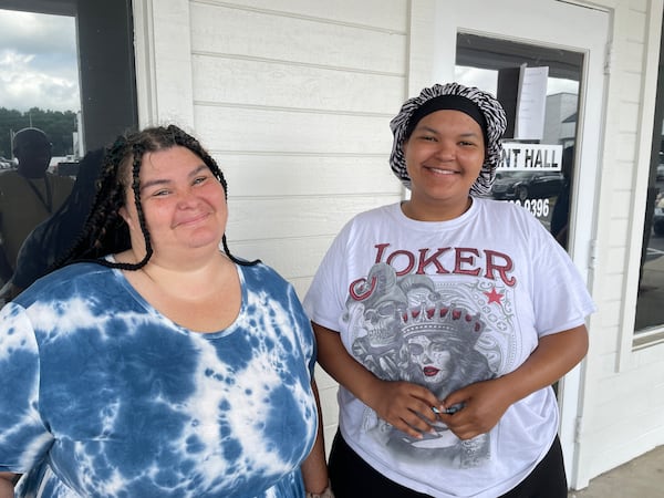 Patricia Brooks (left) and her daughter Breanna Brooks said the three-bedroom apartment they share at Tara Woods Apartments in Clayton County has several structural problems that the lack of water would have exacerbated.