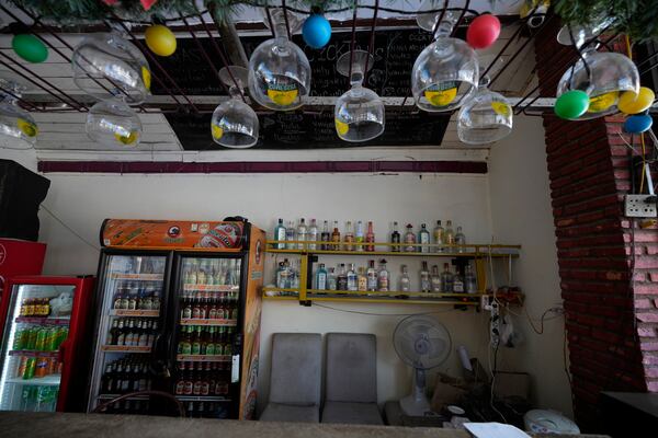 The empty bar of Nana Backpackers hostel in Vang Vieng, Laos, Friday, Nov. 22, 2024. (AP Photo/Anupam Nath)