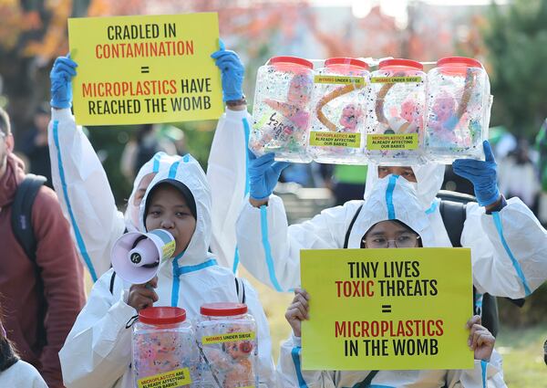 Children attend a rally calling for a strong global plastics treaty ahead of the fifth session of the Intergovernmental Negotiating Committee on Plastic Pollution which sets to be held from Nov. 25 to Dec. 1 in Busan, South Korea, Saturday, Nov. 23, 2024. (Son Hyung-joo/Yonhap via AP)