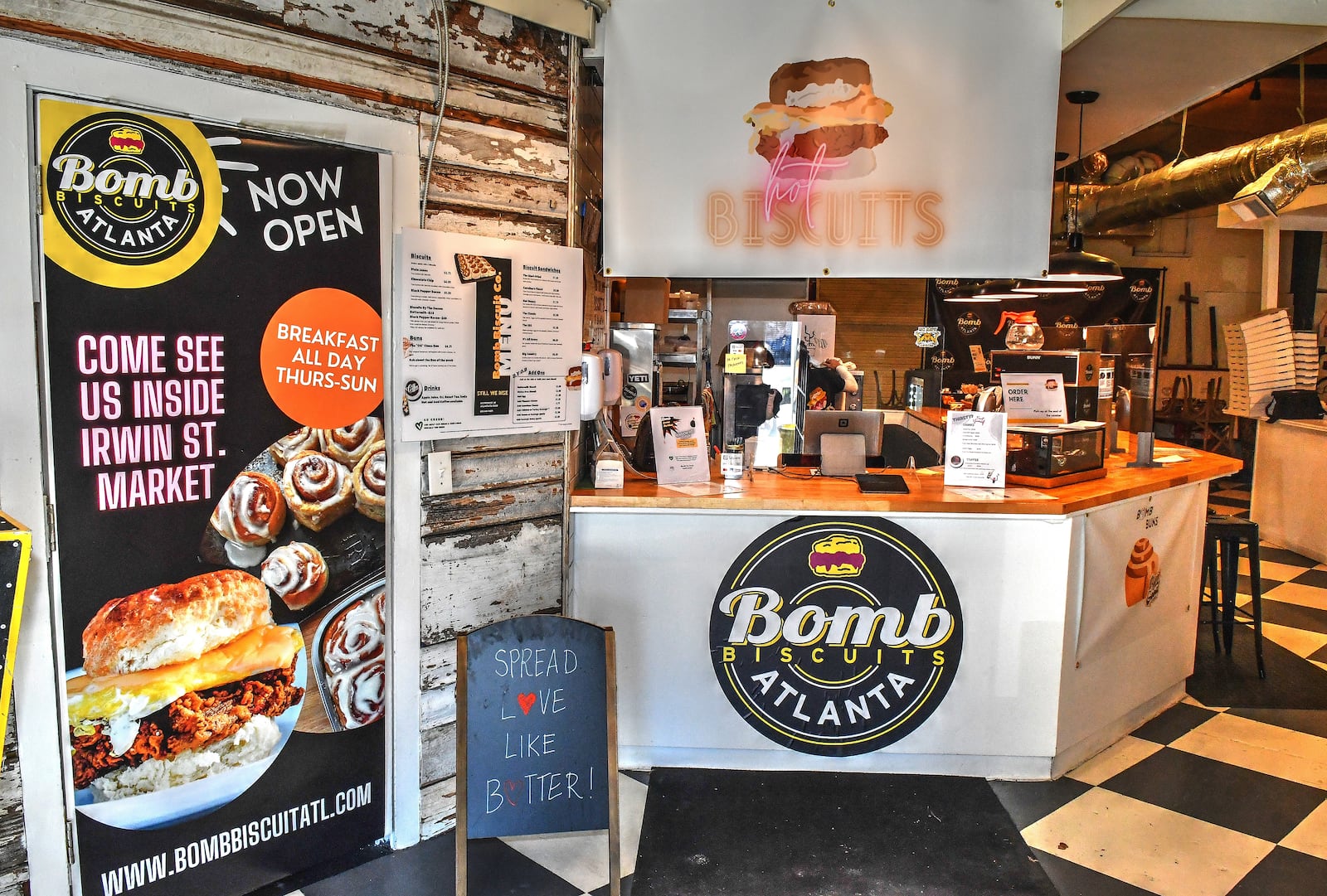 Customers can order at the counter of Bomb Biscuits, a new food stall at Irwin Street Market. Chris Hunt for The Atlanta Journal-Constitution 