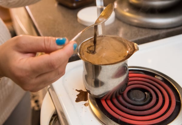 Cookies go well with the strong, cardamom-scented cups of Turkish coffee that Ruwaida prepares. Photo: PHIL SKINNER