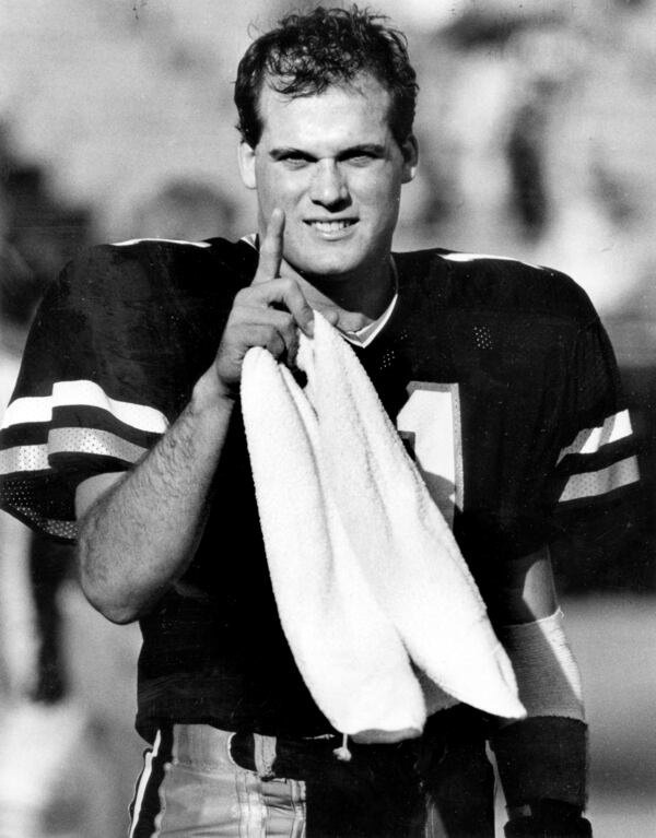 Tech's John Dewberry gives the number one sign as Tech trounces Wake Forrest for a definite share of the ACC title. Circa 1985. Credit/AJC File/W. A. Bridges