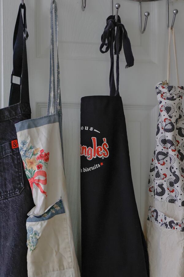 Each of our aprons has a story that tugs at our heartstrings. Natrice Miller/natrice.miller@ajc.com 