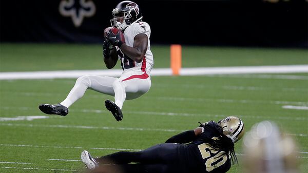 Falcons wide receiver Calvin Ridley pulls in a pass over Saints cornerback Janoris Jenkins in the first half Nov. 22, 2020, in New Orleans. (Brett Duke/AP)