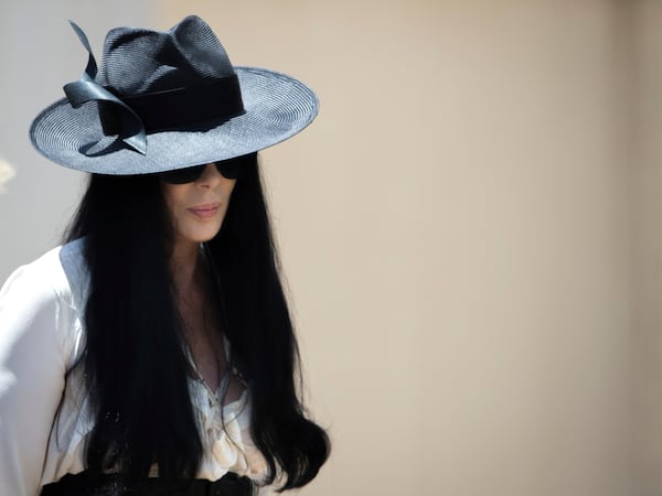  A somber Cher arriving at Snow's Memorial Chapel to say goodbye to Gregg Allman. (AP Photo/Branden Camp)