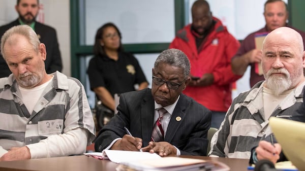 Frankie Gebhardt.  right, and Bill Moore Sr. left, sit silently during a preliminary hearing in a courtroom located inside the Spalding County law enforcement complex, Thursday, November 30, 2017. Both are being accused of murdering Timothy Coggins in 1983. Coggins, who was 23-years-old when the murder occurred, was allegedly killed for socializing with a white woman. 