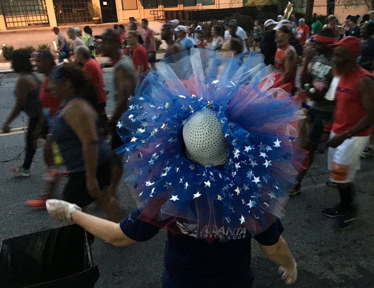 Runners show fashion flair during AJC Peachtree Road Race