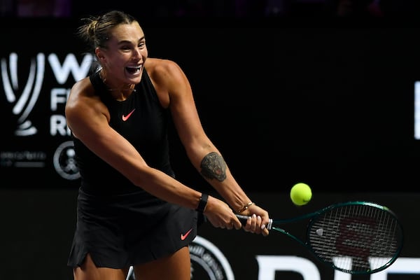 Belarus' Aryna Sabalenka in action during her women's singles semi final match against Coco Gauff of the U.S. at King Saud University Indoor Arena, in Riyadh, Saudi Arabia, Friday, Nov. 8, 2024. (AP Photo)