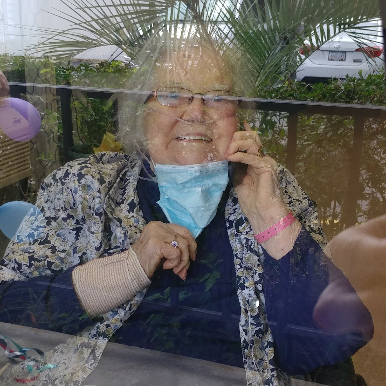 Maxine Williams makes frequent window visits to see her mom, Betty Cason, who lives at a senior facility in southeastern Georgia.