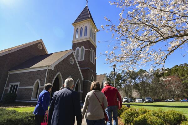 Attendees arrive for a district gathering of the United Methodist Church, held Sunday at Kennesaw United Methodist Church. CONTRIBUTED BY JOHN AMIS