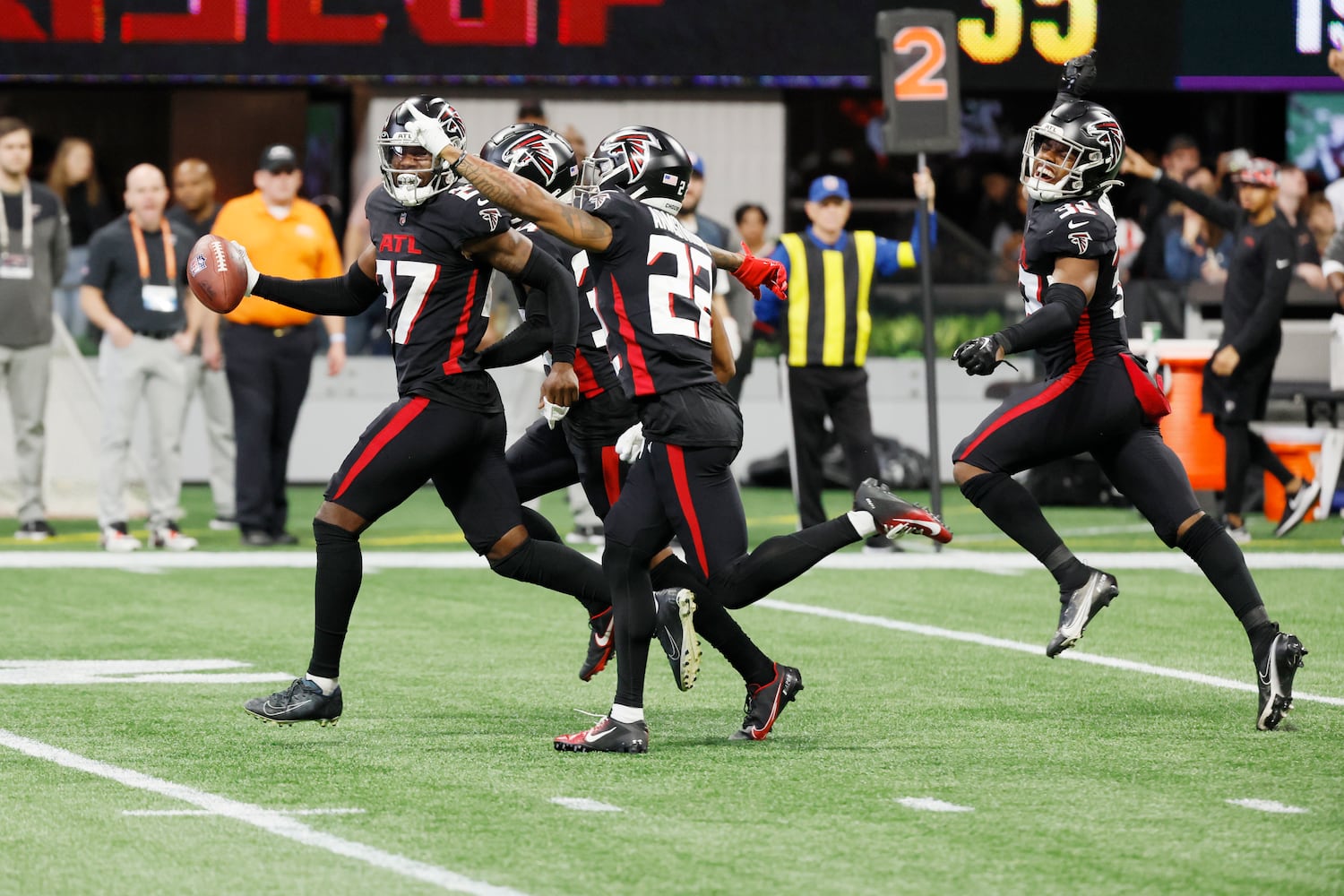 Falcons players react after recovering a fumble during the third quarter against the Buccaneers on Sunday in Atlanta.   (Miguel Martinez / miguel.martinezjimenez@ajc.com)