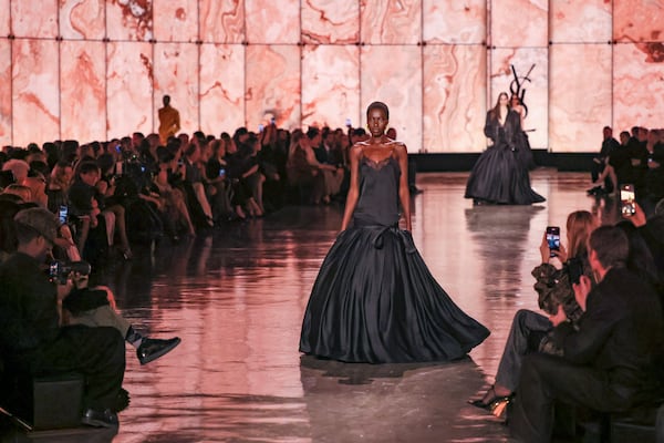 A model wears a creation as part of the Saint Laurent Fall/Winter 2025-2026 Womenswear collection presented Tuesday, March 11, 2025. in Paris. (AP Photo/Thomas Padilla)