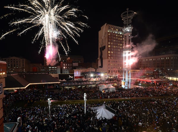 DECEMBER 31, 2012 ATLANTA The crowd celebrates the New Year at Underground Atlanta for the 24th annual Peach Drop in downtown Atlanta Tuesday January 1, 2013. A crowd of a hundred thousand people watched the Peach Drop and fireworks signaling the end of 2012 and the beginning of 2013 KENT D. JOHNSON / KDJOHNSON@AJC.COM