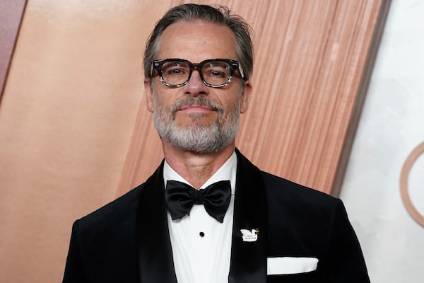 Guy Pearce arrives at the Oscars on Sunday, March 2, 2025, at the Dolby Theatre in Los Angeles. (Photo by Jordan Strauss/Invision/AP)