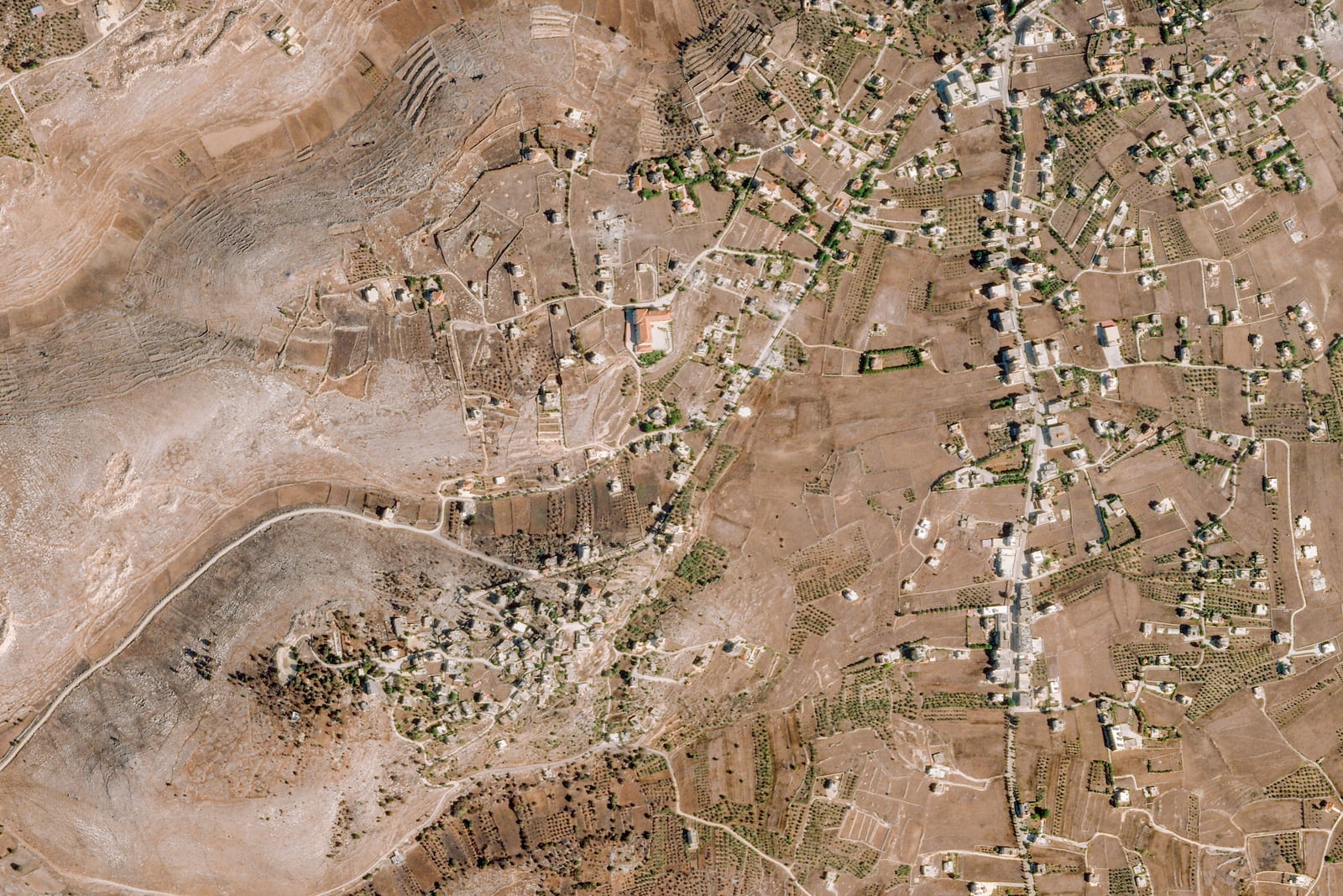 This Sept. 26, 2024, satellite image from Planet Labs PBC shows the village of Mhaibib in southern Lebanon. (Planet Labs PBC via AP)