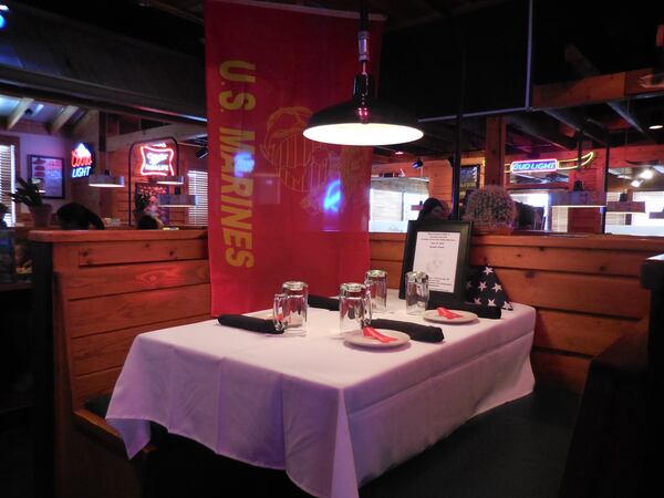 This table at the Texas Roadhhouse restaurant in Chattahooga has been set in honor of the slain servicemen. Photo: Jennifer Brett