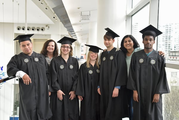 First graduating class of EXCEL program for students with mild intellectual and developmental disabilities, (from left) Frankie Sanders, Rene Reese (career development coordinator), Faith Roman, Alex Goodman, Kurt Vogel, Ankita Raghupathy (teaching assistant) and Rashad Isaac at Georgia Tech’s Scheller College of Business. 