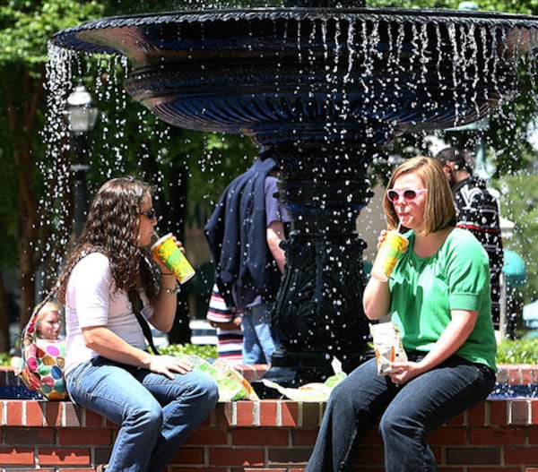 Haley Waldrop (L) & Danielle Hendrix enjoy the sun and fun. Relax and unwind in Glover Park with your coworkers or bring your children to dance and play in the park. For more information, call Marietta's Parks and Recreation Department at 770-794-5601.