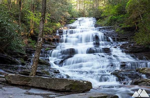 Minnehaha Falls makes its way downward over what looks like giant stair steps.