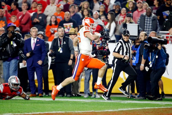 Trevor Lawrence of the Clemson Tigers runs for a 67-yard touchdown. (Photo by Ralph Freso/Getty Images)