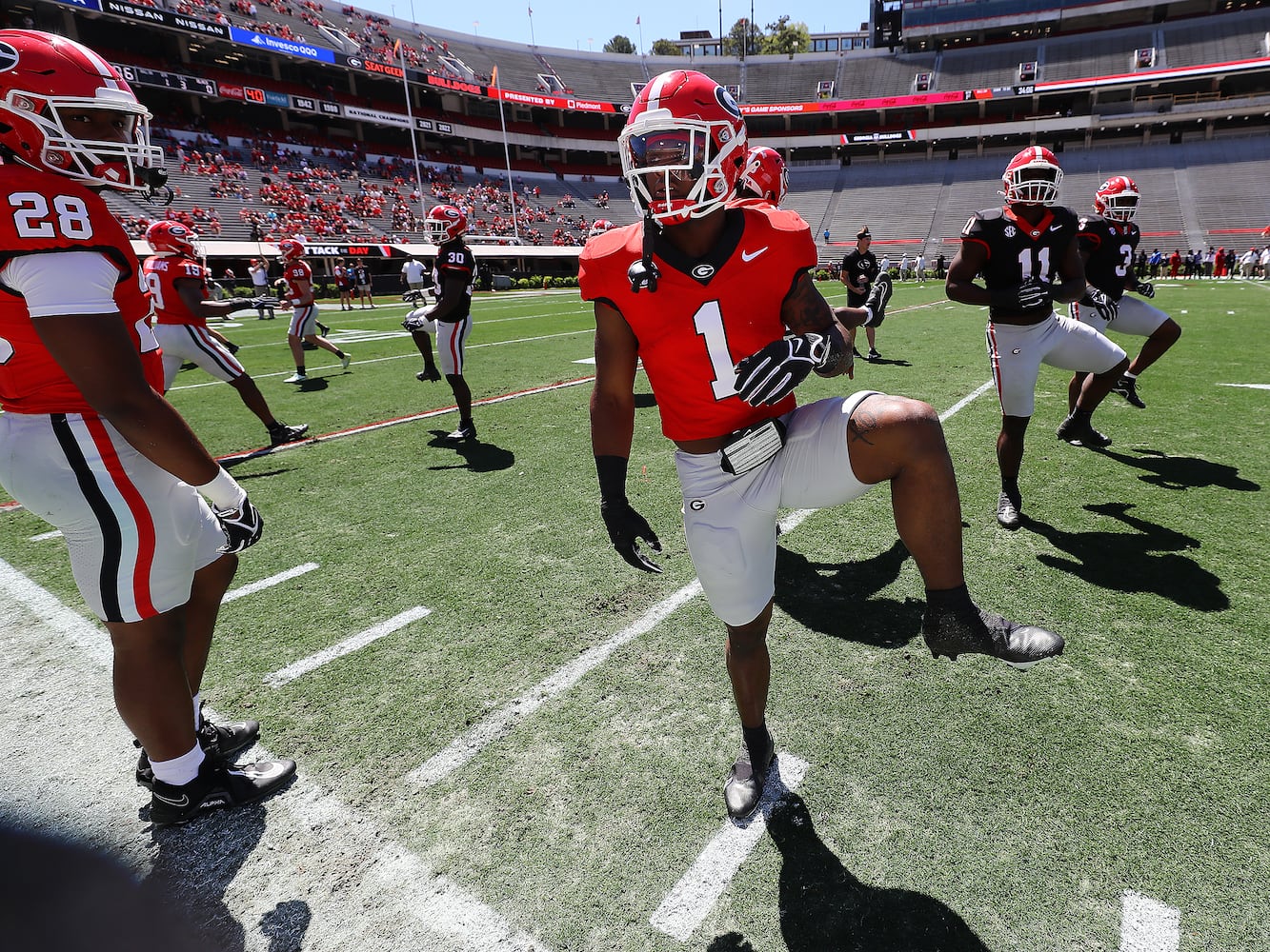 Georgia running back Trevor Etienne loosens up before playing in the G-Day game on Saturday, April 13, 2024.  Curtis Compton for the Atlanta Journal Constitution