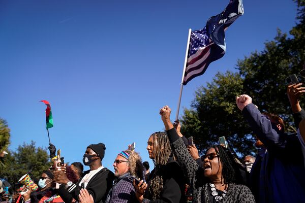 People react outside the Glynn County Courthouse in Brunswick, Ga., on Wednesday, Nov. 24, 2021, after the jury found three men guilty of murder and other charges for the pursuit and fatal shooting of Ahmaud Arbery. Linda Dunikoski, a prosecutor brought in from the Atlanta area, struck a careful tone in a case that many saw as an obvious act of racial violence. (Nicole Craine/The New York Times)