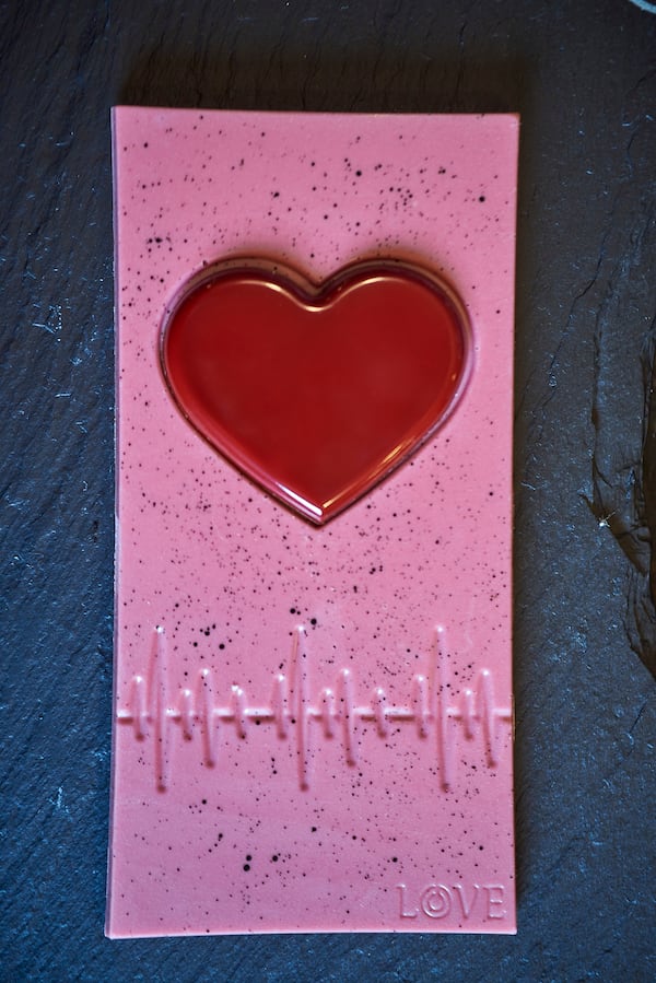 For Valentine’s Day, Temo Foods is offering a raspberry ruby chocolate bar with a candied pistachio dark chocolate heart. Courtesy of Kyle Reynolds