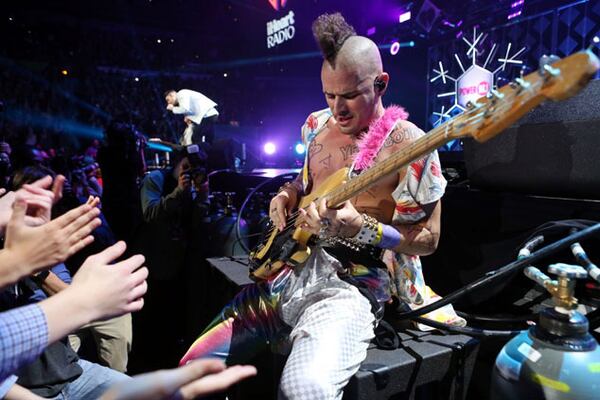 DNCE's Cole Whittle gets close and personal with the crowd during Power 96.1's Jingle Ball. Photo: Robb Cohen Photography & Video /www.RobbsPhotos.com